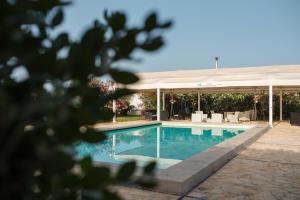 The swimming pool at or close to Relais Antiche Saline