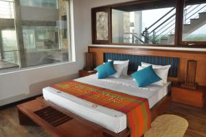 Katil atau katil-katil dalam bilik di Laya Safari Resorts & Spa
