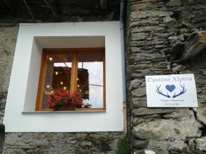 Certifikát, hodnocení, plakát nebo jiný dokument vystavený v ubytování Cantina Alpina