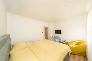 Ένα ή περισσότερα κρεβάτια σε δωμάτιο στο Impression