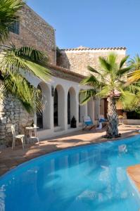 The swimming pool at or close to Casa Azul at Masia Nur Sitges, Adults only