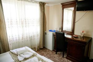 Postel nebo postele na pokoji v ubytování Giandra Resort