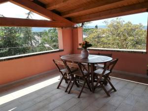 A balcony or terrace at B&B Casa Ghiani