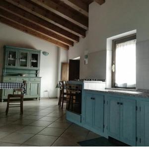 A kitchen or kitchenette at B&B Casa Ghiani