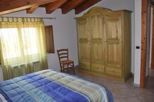 A bed or beds in a room at B&B Casa Ghiani