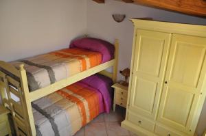 A bed or beds in a room at B&B Casa Ghiani