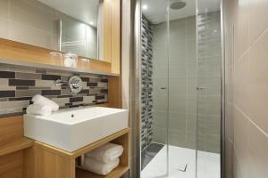 Ванная комната в Jardins de Mademoiselle Hôtel & Spa