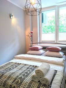 Кровать или кровати в номере Chill & Explore by Cooee Apartments