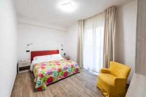 Ліжко або ліжка в номері Hotel Ristorante Vecchia Maremma