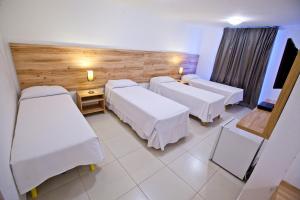 Postel nebo postele na pokoji v ubytování Hotel Refugio