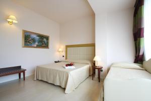 En eller flere senge i et værelse på Hotel Metropolitan + 44 billeder