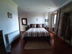 Un pat sau paturi într-o cameră la Casa do Cerrado