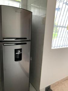 Kuchyň nebo kuchyňský kout v ubytování Aloha Hostel