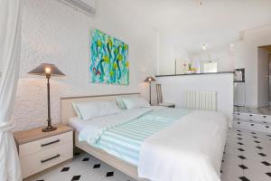 Postel nebo postele na pokoji v ubytování Villa Lina