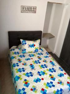 Voodi või voodid majutusasutuse Aloha Hostel toas