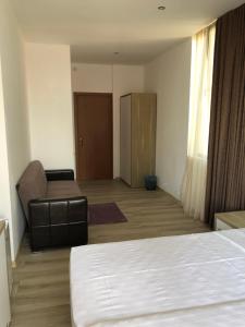 Letto o letti in una camera di M-Rooms