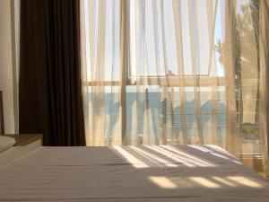 Letto o letti in una camera di M-Rooms