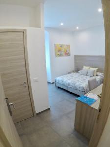 Postel nebo postele na pokoji v ubytování Mare dentro rooms