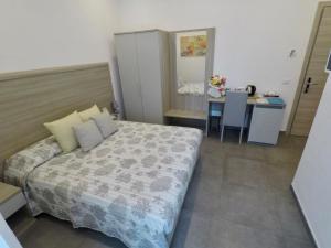 Postel nebo postele na pokoji v ubytování Mare dentro rooms