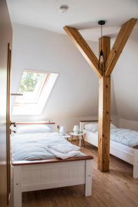 Postel nebo postele na pokoji v ubytování Penzion-apartmán Souček