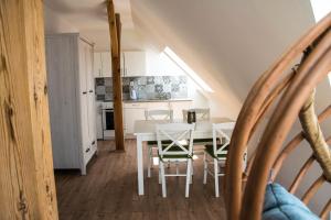 A kitchen or kitchenette at Penzion-apartmán Souček