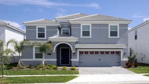 a gray house with a garage at Luxury Pool Villa with Green View-8843IC’ in Davenport