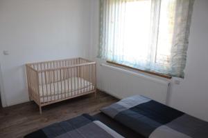 Ένα ή περισσότερα κρεβάτια σε δωμάτιο στο Spreewald Unterkünfte +39 φωτογραφίες