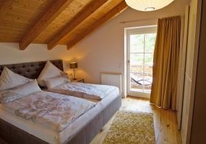 Giường trong phòng chung tại Bergliebe