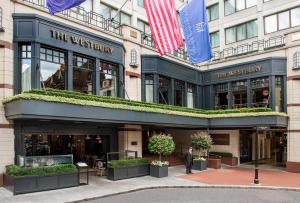 a man standing in front of the westbury hotel at The Westbury Hotel in Dublin