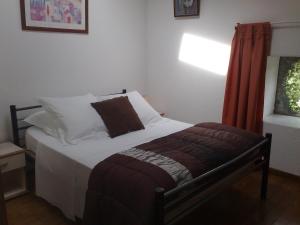 Llit o llits en una habitació de Petit Cerisier