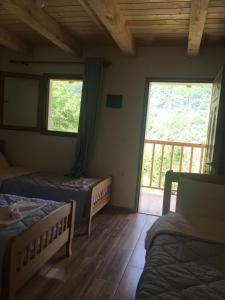 Cama ou camas em um quarto em Bujtina Ziçi