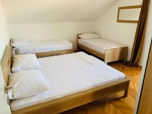 Postel nebo postele na pokoji v ubytování Bibinje Comfort & Style Apartment 2nd floor