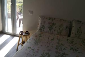 Katil atau katil-katil dalam bilik di piccolo casale a "le Moline" in una vera fattoria
