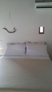 Katil atau katil-katil dalam bilik di piccolo casale a "le Moline" in una vera fattoria