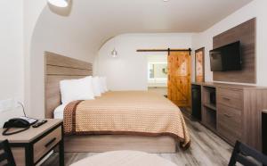 Postel nebo postele na pokoji v ubytování Palace Inn- Louetta