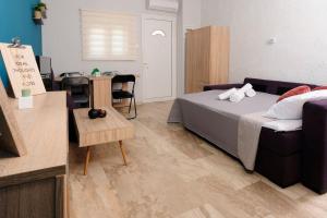 Ένα ή περισσότερα κρεβάτια σε δωμάτιο στο JOY'S HOME