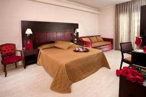 Postel nebo postele na pokoji v ubytování Hotel Capitol + 37 fotografií