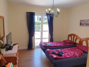 Postel nebo postele na pokoji v ubytování Benimar + 34 fotografií