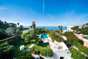 an aerial view of a resort with the ocean in the background at Villa Formica in Ischia