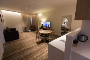 TV a/nebo společenská místnost v ubytování Porter's Plainland Hotel