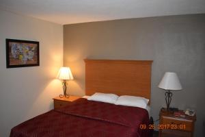 Postel nebo postele na pokoji v ubytování MHO Hotel Bordentown