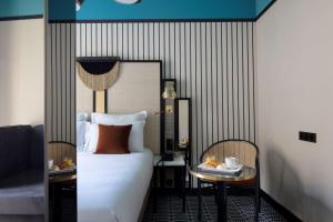 Postel nebo postele na pokoji v ubytování Best Western Premier Hotel Roosevelt