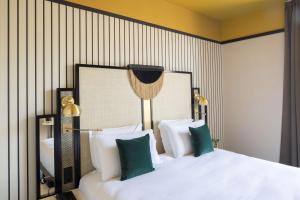 Postel nebo postele na pokoji v ubytování Best Western Premier Hotel Roosevelt