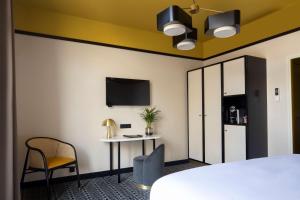 TV a/nebo společenská místnost v ubytování Best Western Premier Hotel Roosevelt