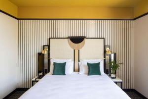 Postel nebo postele na pokoji v ubytování Best Western Premier Hotel Roosevelt