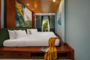 Voodi või voodid majutusasutuse Hanoi La Selva Central Hotel & Spa toas