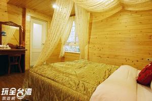 Postel nebo postele na pokoji v ubytování House of Ahan