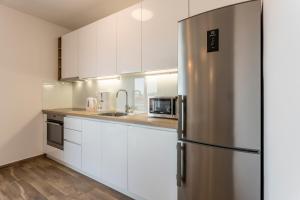 Kuchyňa alebo kuchynka v ubytovaní Luxury view apartments