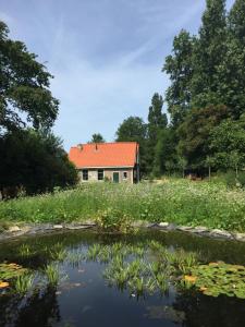 Galeriebild der Unterkunft Het Kunstenaarshuis in Kamperland