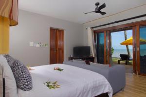 Postel nebo postele na pokoji v ubytování Chongfah Resort Khao Lak - SHA Extra Plus
